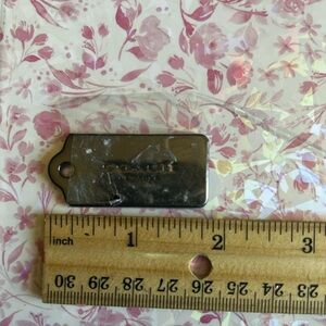 COACH New York bag tag